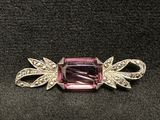 a pink tourmaline and diamond broochle