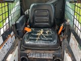 a seat in the back of a truck that is parked