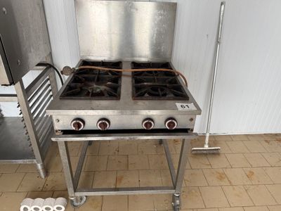 une photo d'une cuisinière en acier inoxydable à deux feux