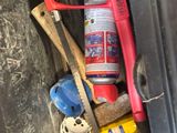 an image of a trash can with tools in it