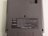 an image of a nintendo game cartridge sitting on top of a table