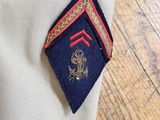 a close up of a uniform on a wooden floor