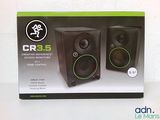 the box of a pair of speakers is sitting on a table