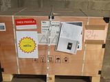 a wooden box with a sign on it sitting on a pallet