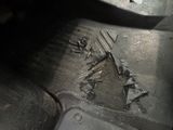 a close up of a motorcycle tire with a hole in the tire