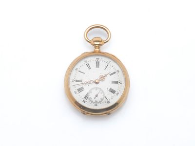 une montre de poche en or avec des chiffres romains