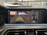 the dashboard of a car with a camera mounted to it ' s dashboard