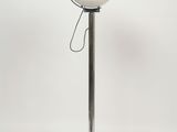 an image of a lamp that is on a metal pole