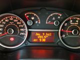 a close up of a car dashboard with various gauges and numbers
