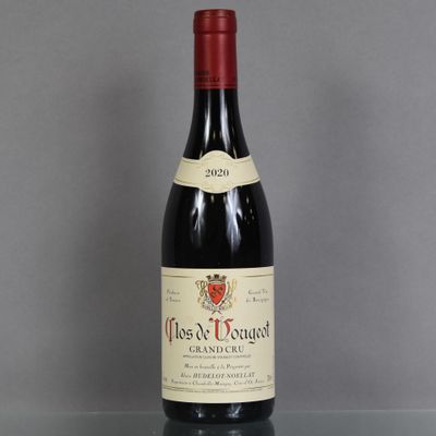 a bottle of wine that is sitting on a table