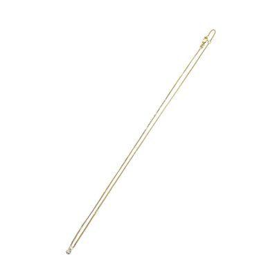 a close up of a metal stick on a white background