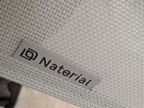 a close up of a chair with a sticker on it