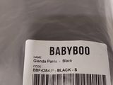 a close up of a label on a black plastic bag