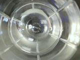 a close up view of a water bottle with a small amount of water in it