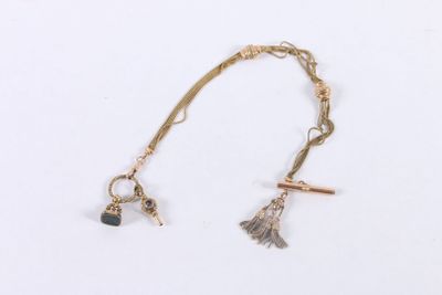 Châtelaine en or jaune et rose 750 ‰ formée d'une chaîne à m…