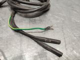 a close up of a metal surface with wires and wires on it