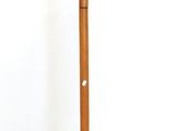 a wooden coat stand with a coat rack on top of it