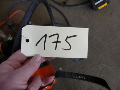 a person holding a piece of paper with the word afs written on it