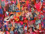 an image of a painting of many different faces on a wall
