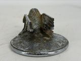a metal object that is sitting on a table