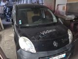 a small car that is parked in a garage
