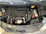 a picture of a car engine with its hood open