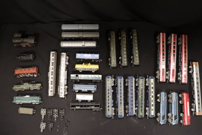 a lot of toy trains that are on the table
