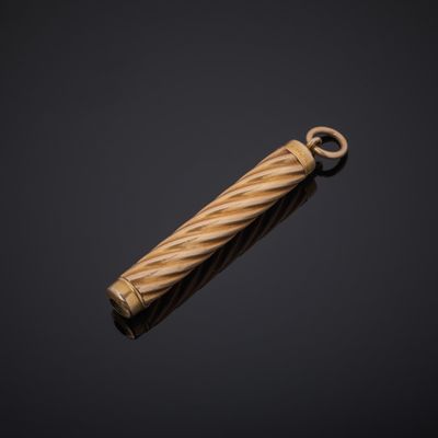 a close up of a wooden object on a black background