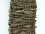 a person that is holding a large pile of yarn