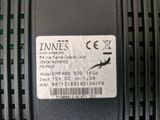 a label on the back of a small router