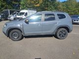a picture of a grey car parked in a parking lot