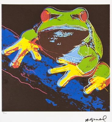 une image représentant une grenouille assise sur une feuille de papier
