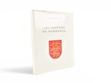 un livre blanc avec un bouclier rouge sur la couverture