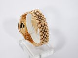 an image of a close up of a watch on a stand