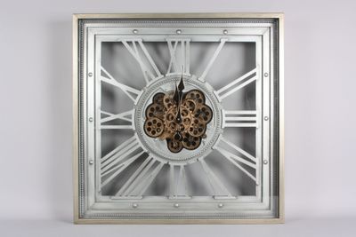 importante pendule squelette en métal et contreplaqué découp…