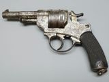 a gun that is sitting on a table