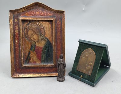 une image représentant une femme et une statue de Jésus