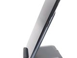 a cell phone that is sitting on top of a stand