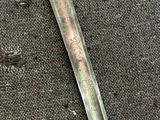 a knife that is laying on the ground on the ground