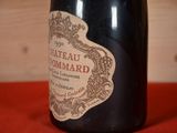 a bottle of wine that is sitting on a table