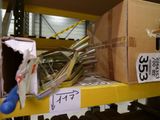 a box of scissors sitting on a shelf in a warehouse