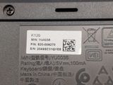 a close up of a laptop with a sticker on it