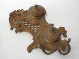 an antique brass plate with a lid and a decorative design