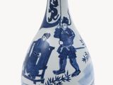 a blue and white vase with a picture of people on it