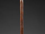an image of a baseball bat with a wooden handle on a gray background