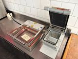 l'image d'une machine posée sur un comptoir
