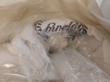a plastic bag with a stuffed animal inside of it