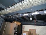 a picture of a ceiling that has some electrical wires on it
