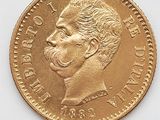 l'image d'une pièce d'or sur laquelle figure le visage d'un homme