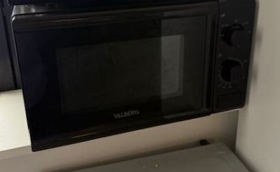 a microwave that is sitting on top of a counter